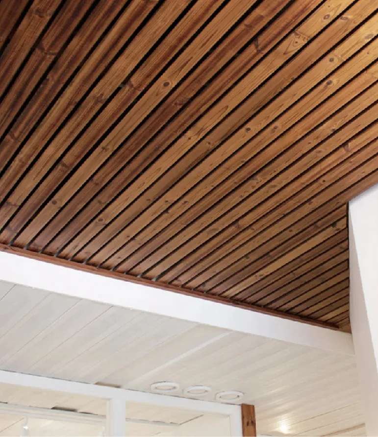 Installed Luna SHP 42×68 Thermowood battens on exterior facade showing natural Nordic wood texture